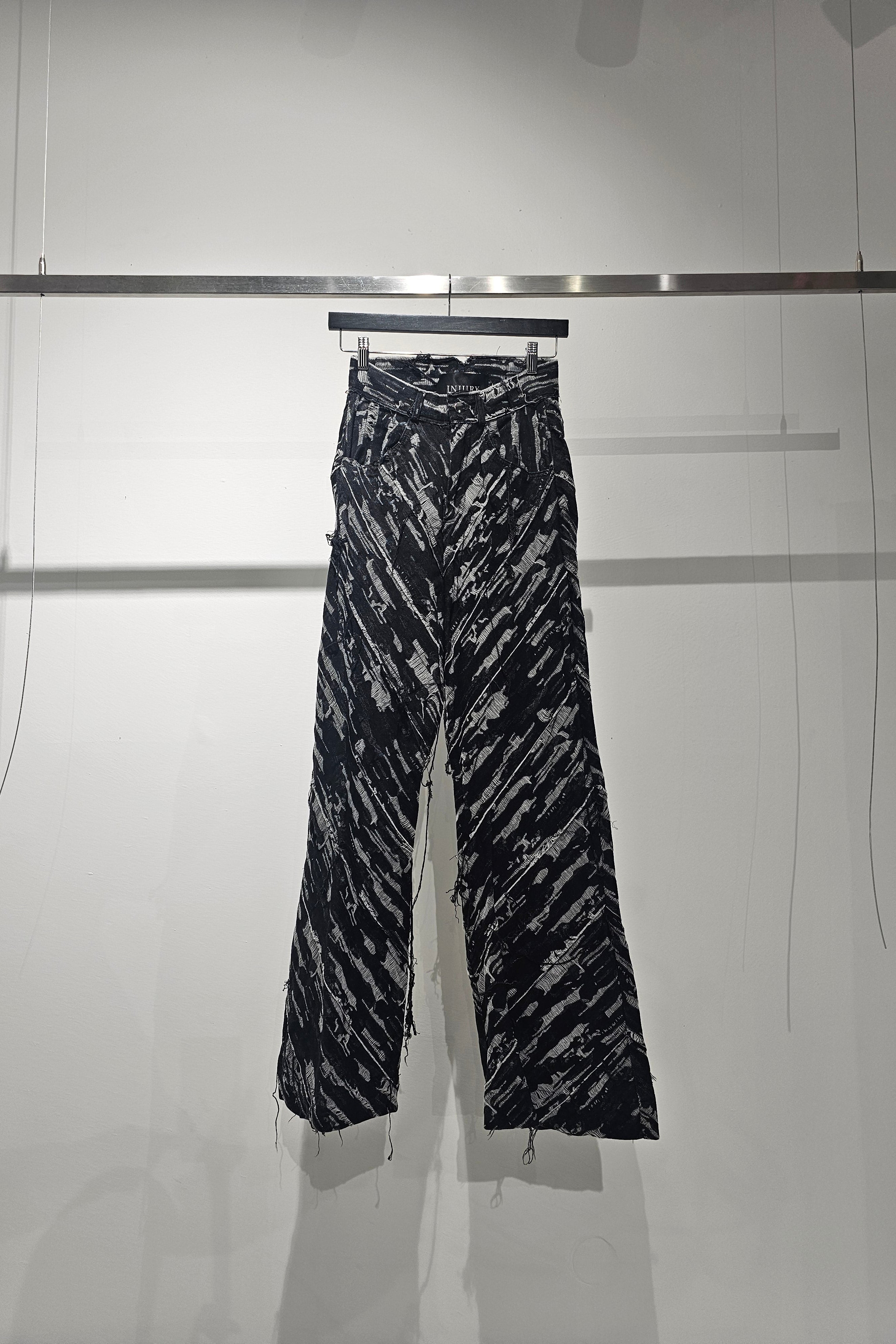 Distressed denim pants