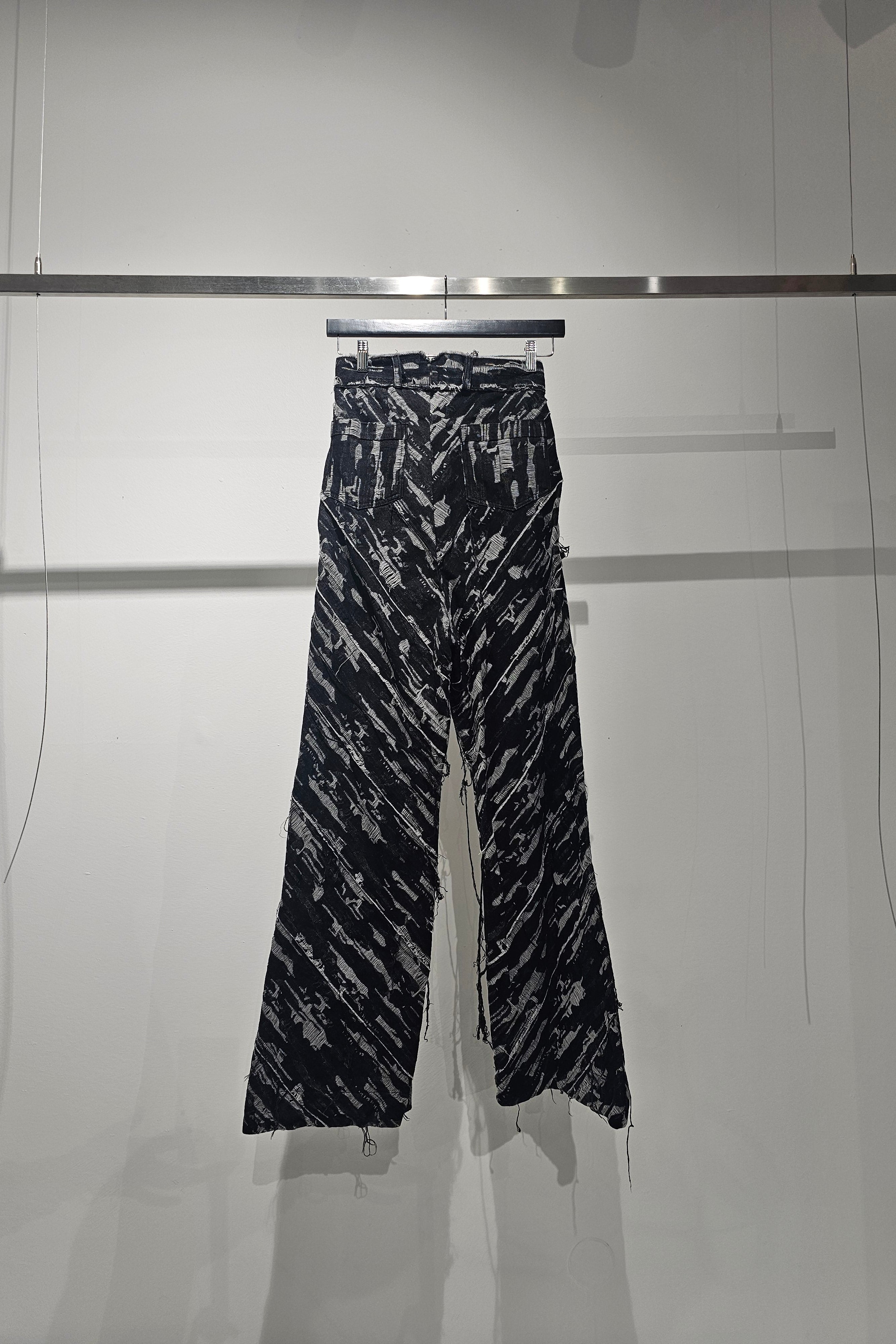 Distressed denim pants