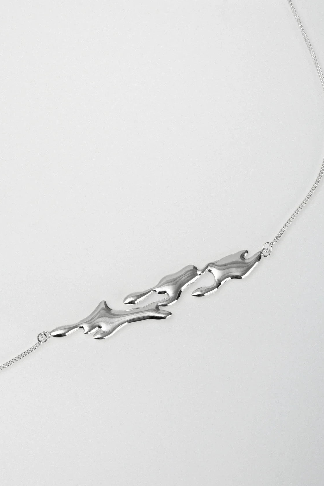 LIQUIFIED TRIBAL BODY CHAIN